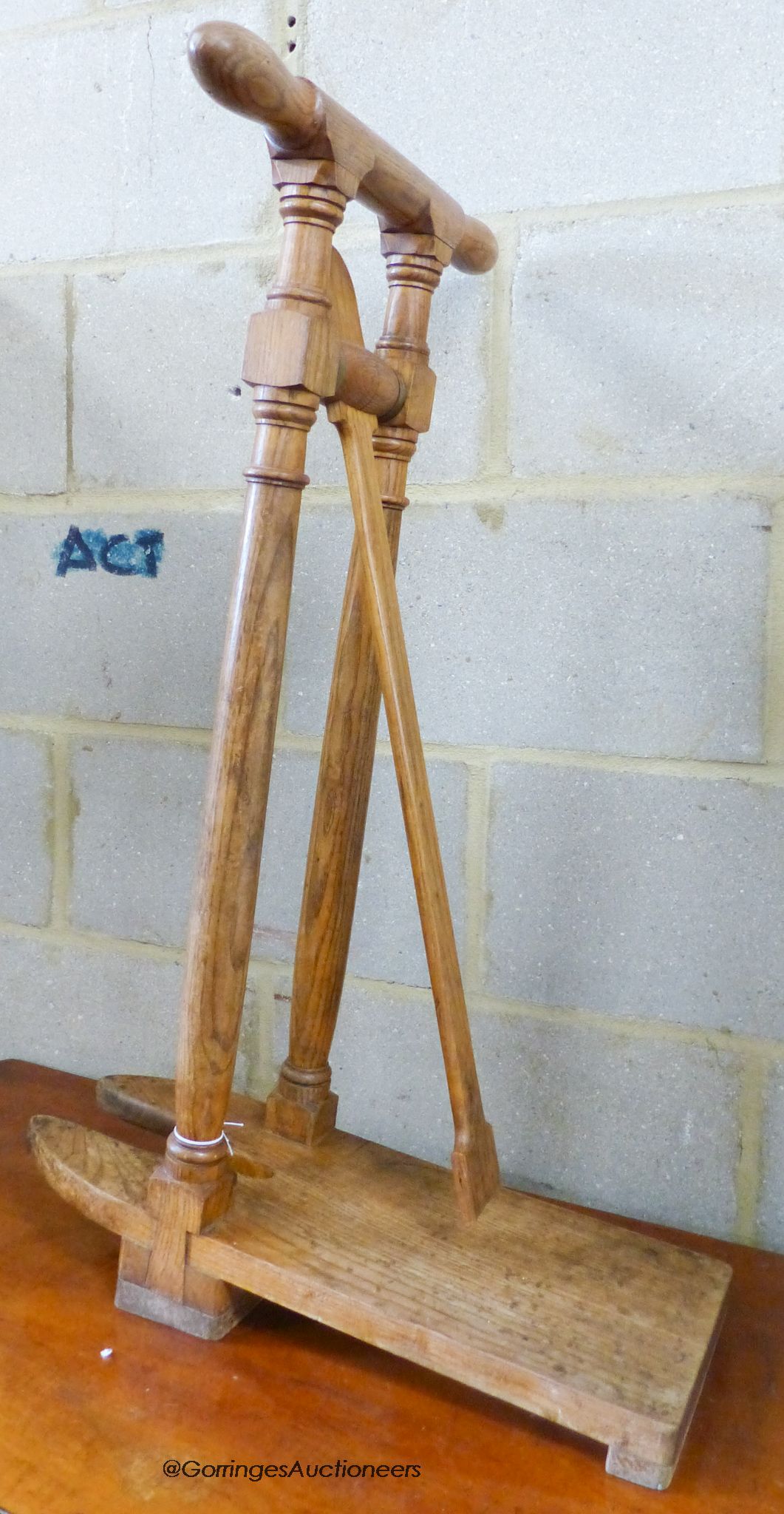 A Victorian oak boot jack, width 52cm, height 82cm